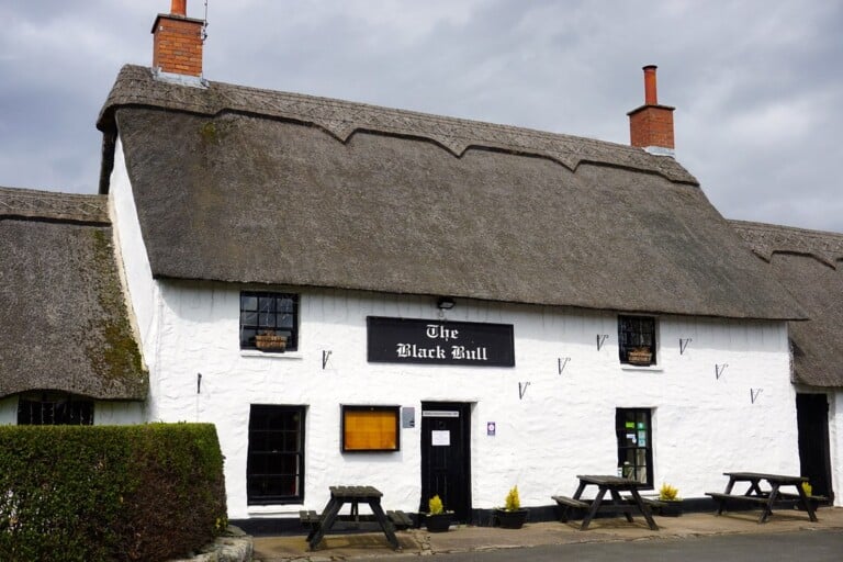 Thatched village pub in rural Northumberland, similar to the local near Chatton