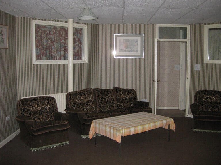 A cosy cottage living room interior, similar in feel to The Old Post Office