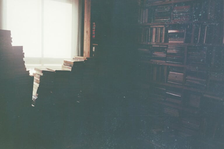 Cosy secondhand bookshop interior with rows of shelves, similar to Barter Books in Alnwick